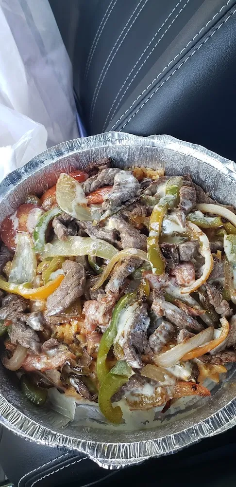 Arroz Con Carne Asada